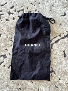 CHANEL Black Drawstring Pouch with White Logo